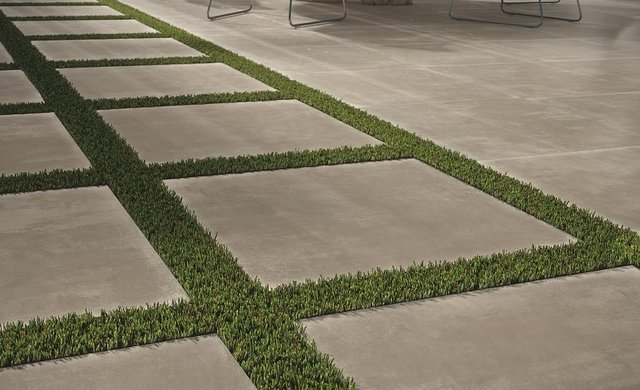 Schicke Terrasse aus Feinsteinzeug mit strahlender Quarzit-Optik