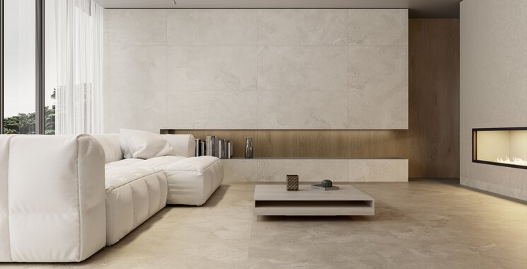 Großformatige Boden- und Wandfliesen in warmem Beige mit Natursteinoptik für moderne Wohnräume.