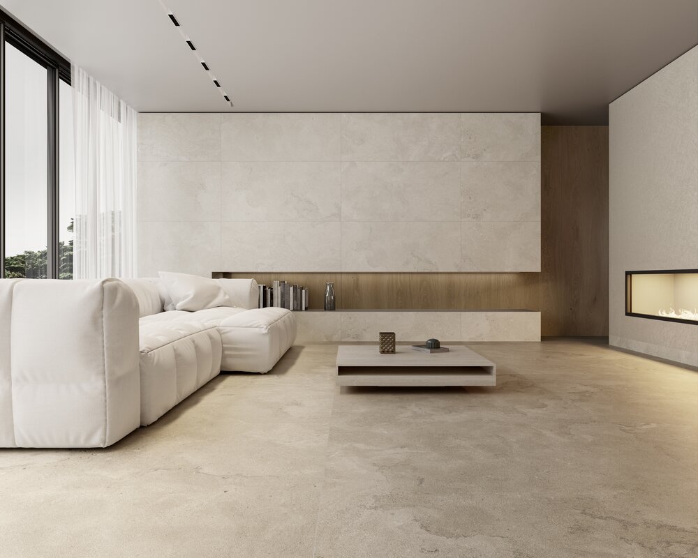 Großformatige Boden- und Wandfliesen in warmem Beige mit Natursteinoptik für moderne Wohnräume.